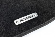 Car mat badge for Nissan